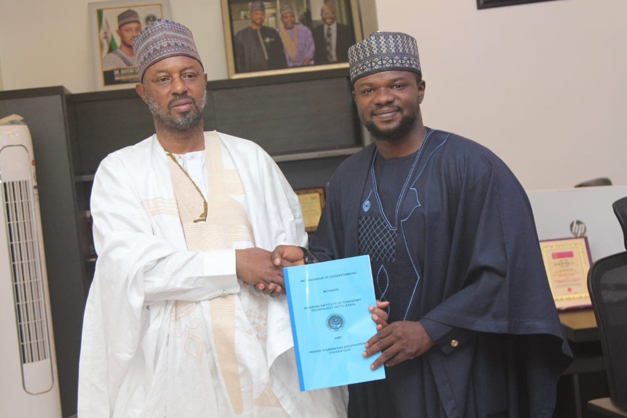 Workbridge and NITT representatives presenting the signed memorandum of understanding